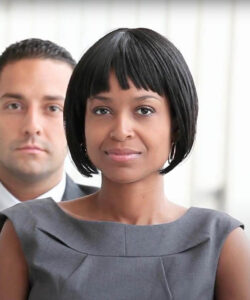 African American female in front of male